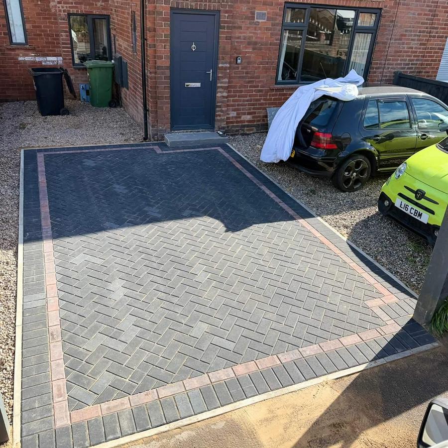 Charcoal driveway with contrast banding