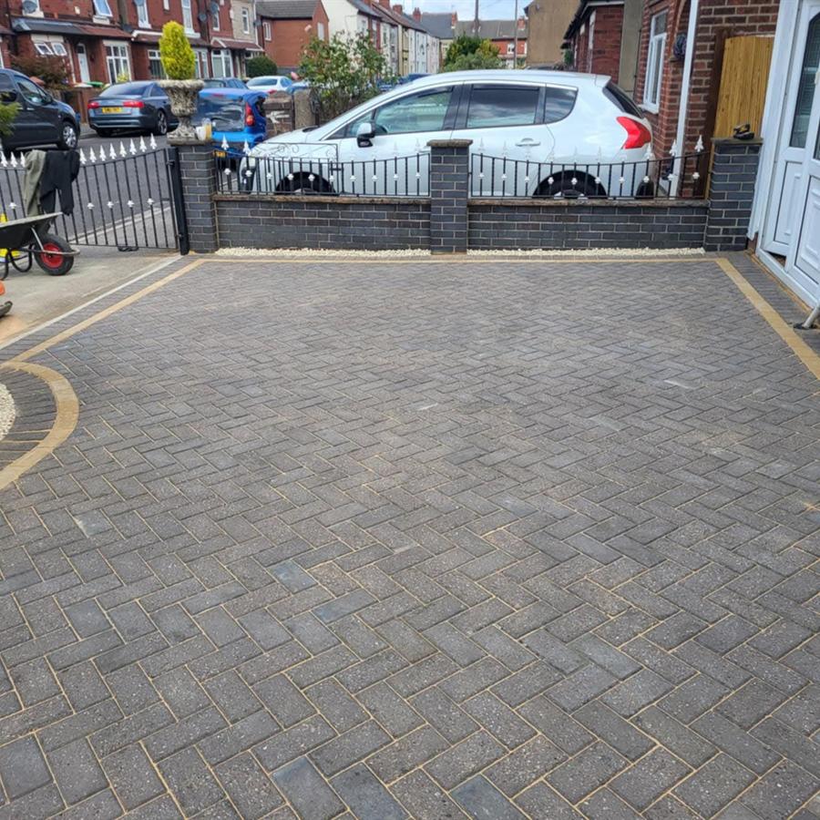 Block paved driveway and parking area