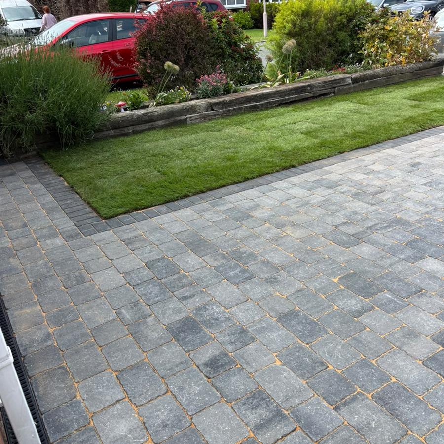 Block paving driveway with lawn edge