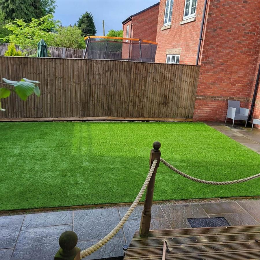 Artificial grass lawn with rope edging