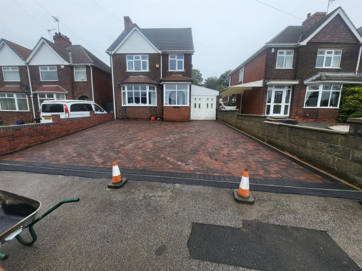 Driveway stripped back and edged, ready for the new surface